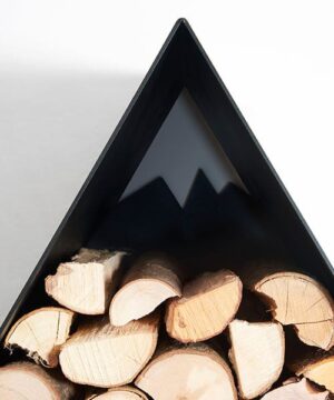 Design Matterhorn log holder that recalls the shape of the famous mountain with a large load of wood and to hang on the wall