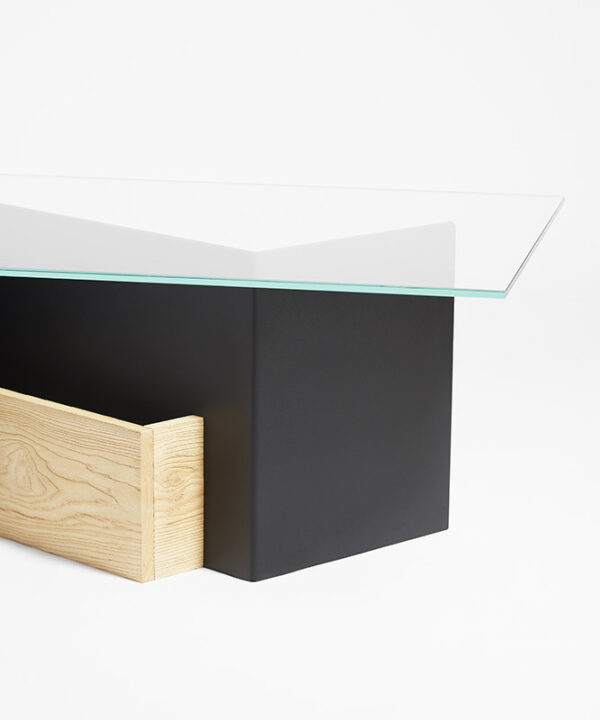 Ambiez design coffee table with tempered glass top and bent metal body and brushed ash table reminiscent of the silhouette of the mountains